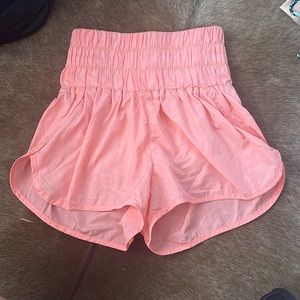 HOT PINK FREE PEOPLE MOVEMENT “THE WAY HOME” SHORTS